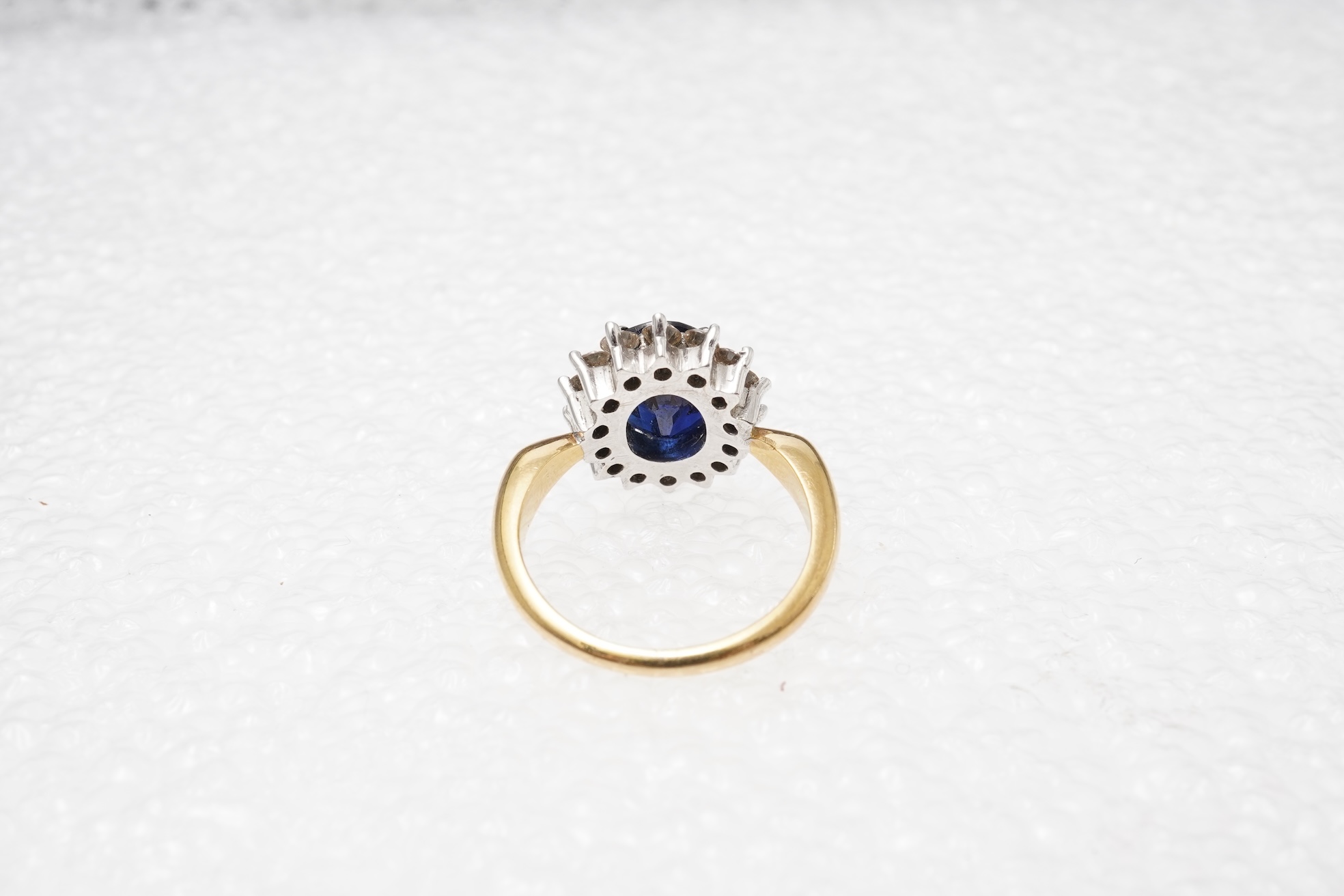 A sapphire and diamond cluster ring